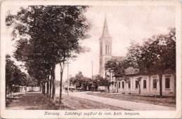 Karczag. Széchényi sugárut és rom. kath. templom.