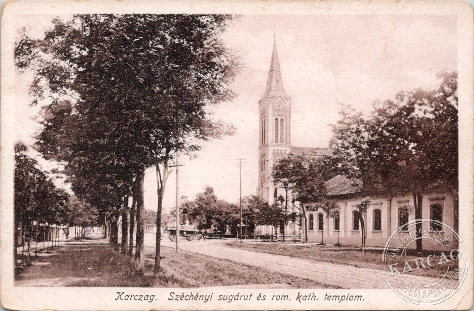 Karczag. Széchényi sugárut és rom. kath. templom.